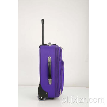 Miękki, toczący się fioletowy bagaż